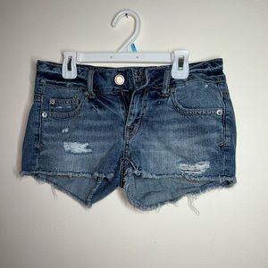 American Eagle Dark Blue Distressed Low Rise Jean Shorts
